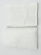 Load image into Gallery viewer, Pleated off white linen napkins — timeless, sustainable, and beautifully textured for your minimalist table setting. Their minimalist design suits neutral homes, eco-friendly interiors, and modern table decor beautifully.