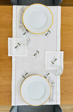 Load image into Gallery viewer, White linen table runner, delicately embroidered with lily of the valley flowers