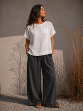 Ielādēt attēlu galerijas skatītājā, Textured white linen blouse with handmade tulip appliqué for women