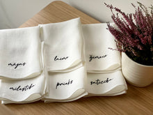 Load image into Gallery viewer, Linen napkins embroidered with MĪLESTĪBA, LAIME, ĢIMENE, PRIEKS, MĀJA, SATICĪBA, set of 6