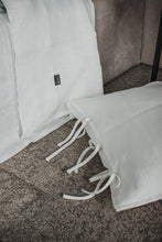 Load image into Gallery viewer, The main decorative element of the SKINNY TIES pillowcase are same material tailored 1 cm wide narrow cords at the side of pillowcase that you can tie in a bow and 1 cm flange all around.