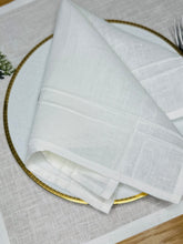 Load image into Gallery viewer, Pleated off white linen napkins — timeless, sustainable, and beautifully textured for your minimalist table setting. Their minimalist design suits neutral homes, eco-friendly interiors, and modern table decor beautifully.
