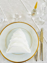 Load image into Gallery viewer, Pleated off white linen napkins — timeless, sustainable, and beautifully textured for your minimalist table setting. Their minimalist design suits neutral homes, eco-friendly interiors, and modern table decor beautifully.
