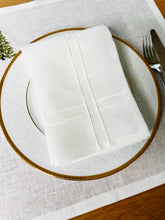 Load image into Gallery viewer, Pleated off white linen napkins — timeless, sustainable, and beautifully textured for your minimalist table setting. Their minimalist design suits neutral homes, eco-friendly interiors, and modern table decor beautifully.

