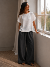 Ielādēt attēlu galerijas skatītājā, Textured white linen blouse with handmade tulip appliqué for women
