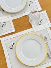 Load image into Gallery viewer, linen coasters embroidered with lily of the valley. Made from natural European linen, they protect surfaces beautifully while adding a refined spring-floral detail. Perfect for coffee moments, hosting, and thoughtful gifting.
