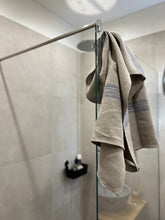 Ielādēt attēlu galerijas skatītājā, A heavyweight linen towel in Natural color with stripes is absorbent and dries quickly and with two loops for easy hanging.

Linen is naturally antimicrobial and allows for easy airflow ensuring your towels dry quicker and stay free of mildew, germs or unpleasant odors.

Classic and beautiful linen towels will suit any bathroom. That large linen towel is great for wrapping it after a bath, shower or enjoying a sauna. The linen towel is big enough to be used on the seashore - by laying it in the warm sand an
